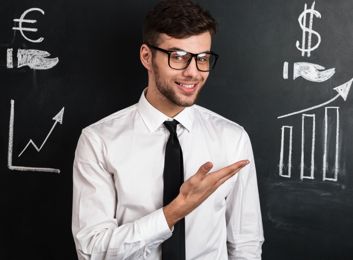 Young successful man in white shirt presenting new financial pro